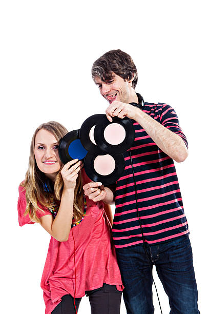 istock Couple playing around with vinyl records 467148755