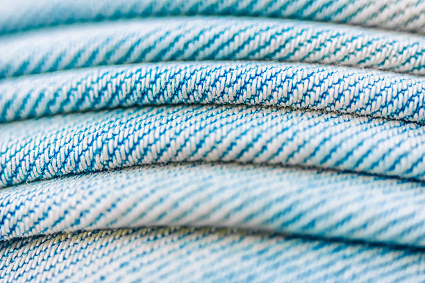 istock blue jeans texture. Focus in the center of the frame 467148780