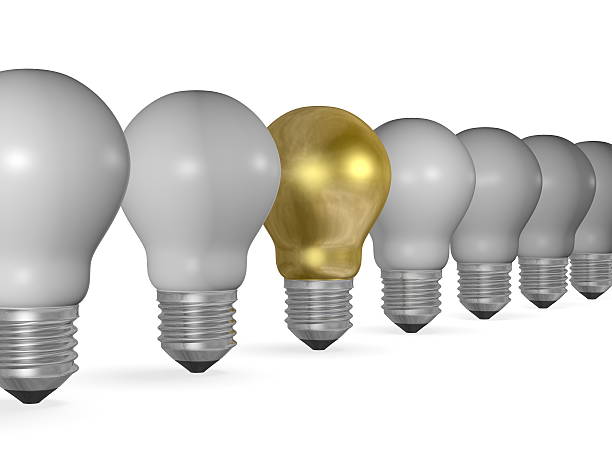 istock One golden light bulb in row of many grey ones 467149145