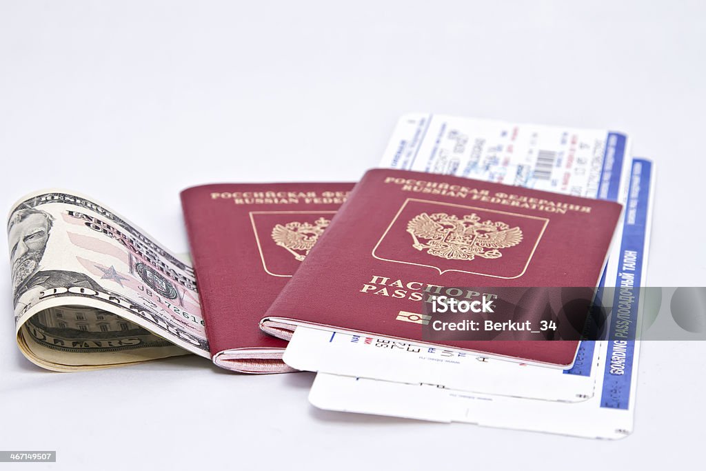 Fees for vacation necessary things International passport, cash and tickets lie on a white background Passport Stock Photo