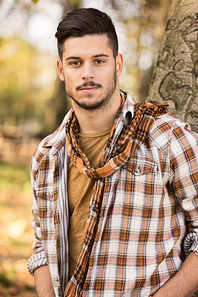 istock Young man in a checkered shirt 467149701