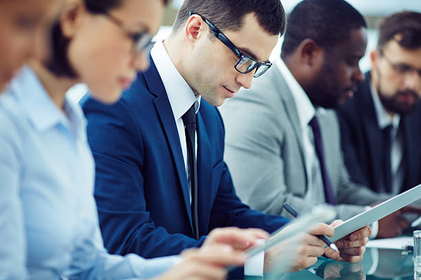 istock Man in business attire at a lecture 467151000