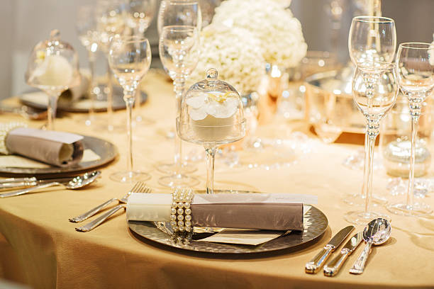 istock Elegant table set in soft creme for wedding event party. 467152311