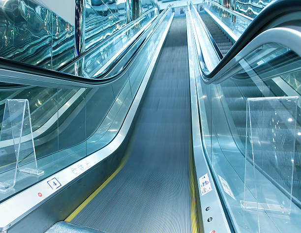 istock blue modern escalator in business center 467152313