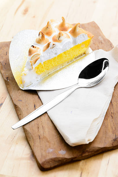 istock Lemon tart on wooden table 467152858