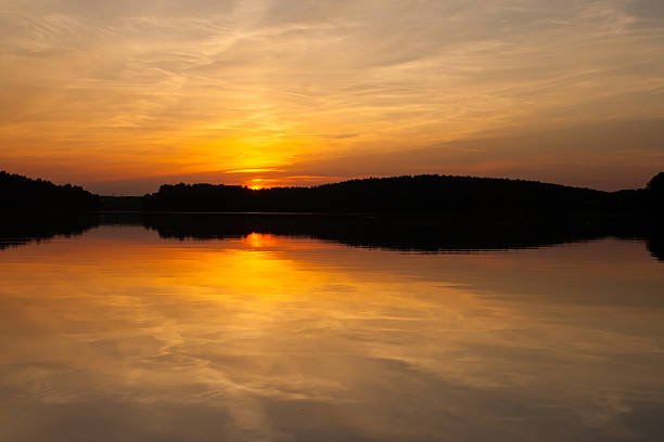 istock Beautiful sunset over calm lake 467152928