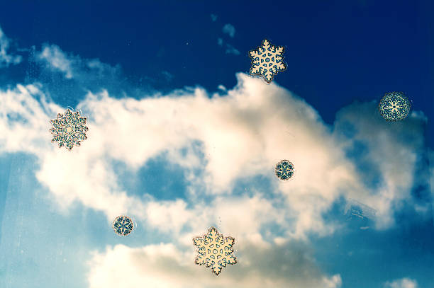 istock Snowflakes with blue sky and white cloud 467153602