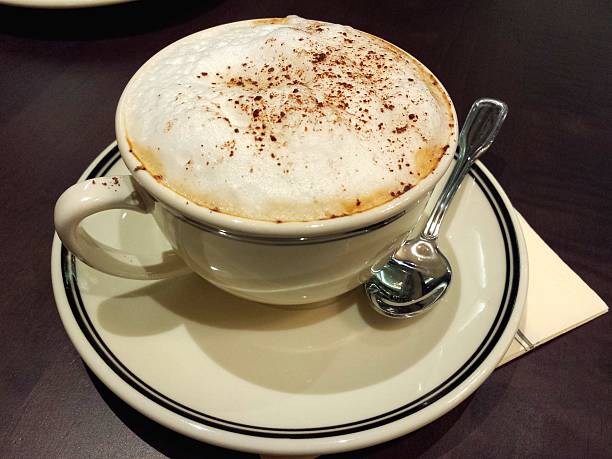 istock Cappuccino Coffee isolated on dark background 467159468
