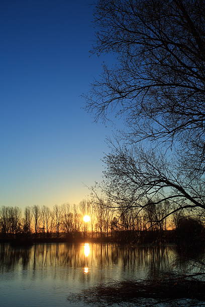 istock Beautiful morning sunrise by Danish lake mirror effect 467160533