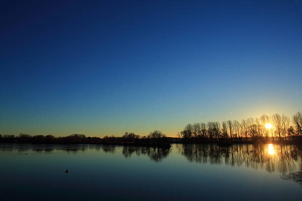 istock Beautiful morning sunrise by Danish lake mirror effect 467161105