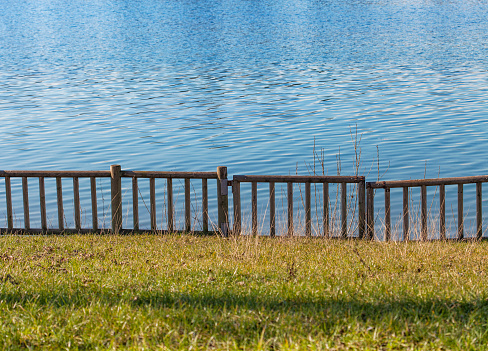 Wooden fence near the lake