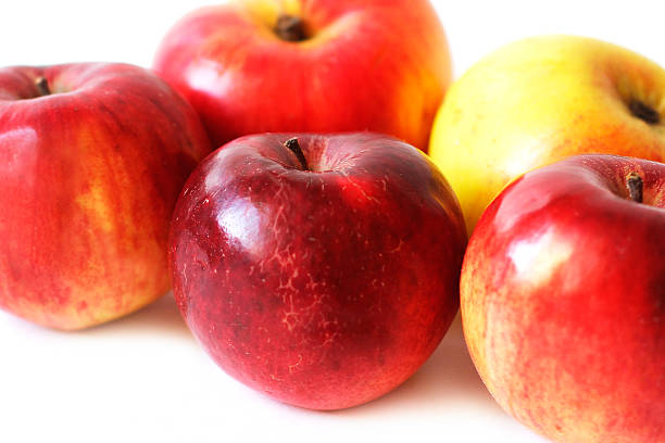 istock Juicy apples close up on white background 467174140