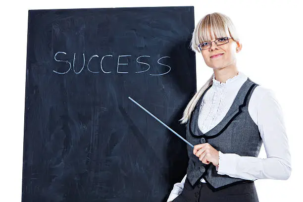 Portrait of elegant business woman with chalk board on white background