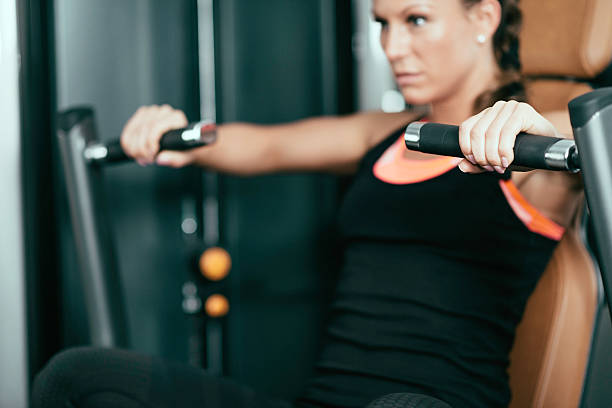 istock Female athlete exercising on chest press 467176286