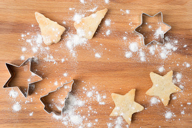 istock Christmas cookies and baking dish on a wooden board 467179049