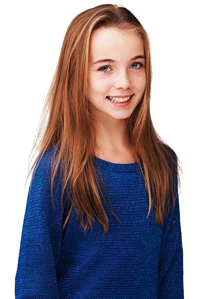 Portrait of a young girl  in studio against a grey backdrop, tilt shift lens