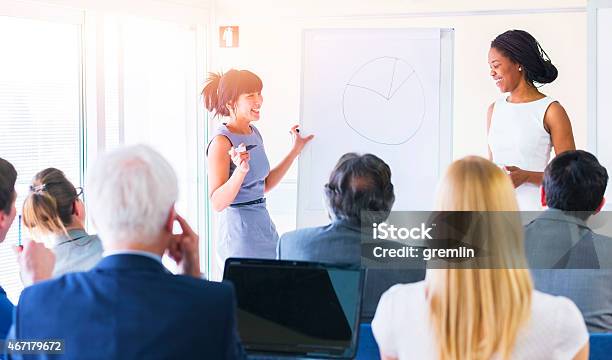 Group Of Business People Teacher Seminar Classroom Stock Photo - Download Image Now