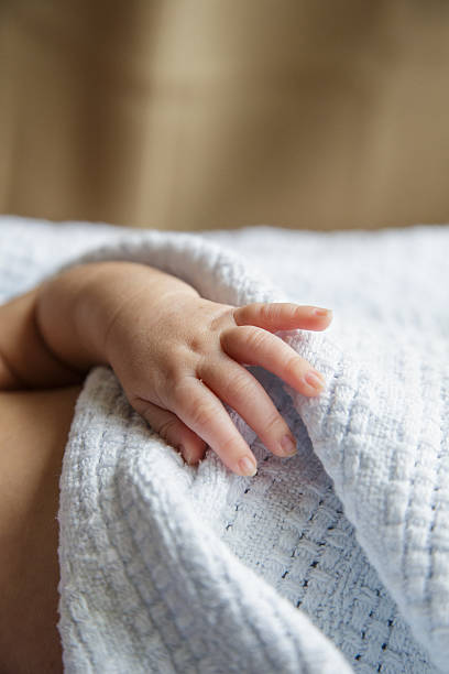 istock hand of a baby 467180633