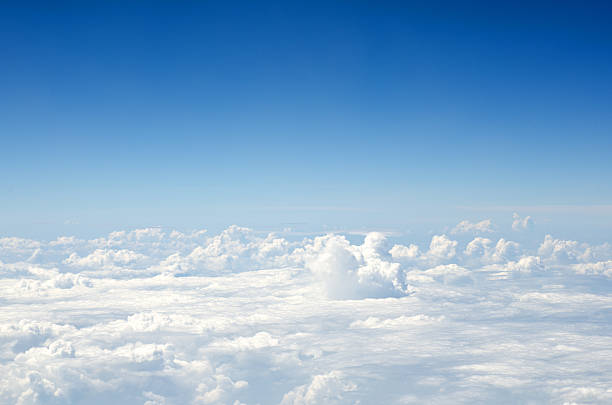 Aerial view of blue sky and clouds Clouds, a view from airplane window. above cloud stock pictures, royalty-free photos & images