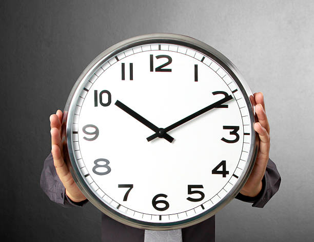 istock Businessman with alarm clock 467185953