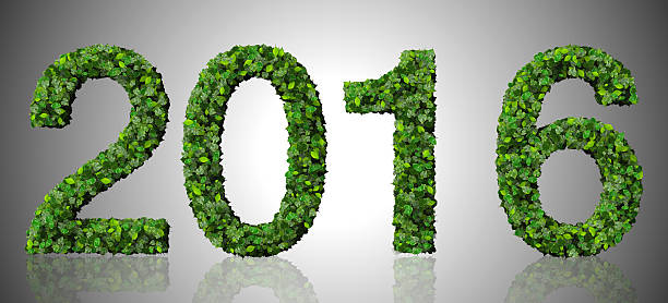 istock Year 2016, date made from green leaves on gradient background. 467187236