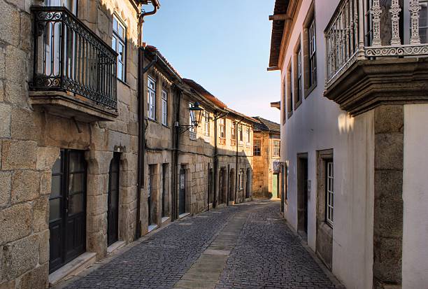 istock Old street in Vila do Conde 467190473