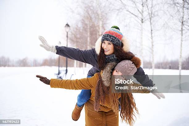 Wintertime Merriment Stock Photo - Download Image Now - Parka - Coat, 20-29 Years, 2015