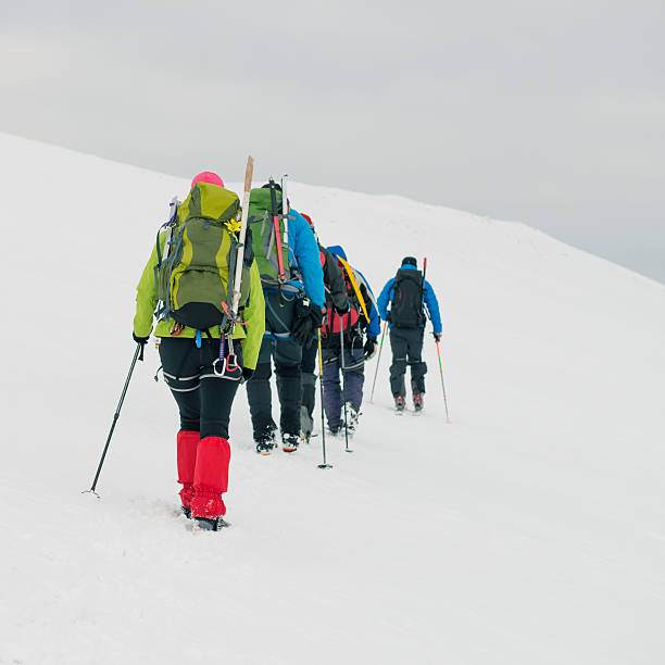 istock Mountaineers walking on mountain. 467192808