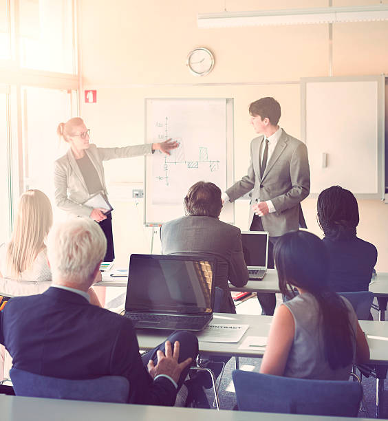 istock Group of business people, teacher, seminar, classroom 467193178