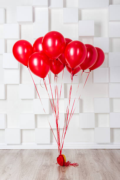 istock Red balloons in the room 467194206