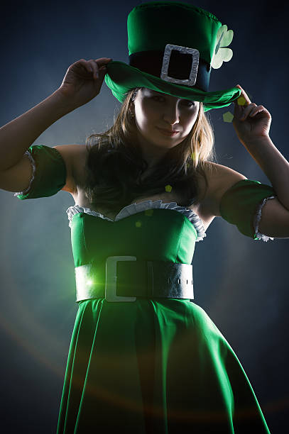 istock woman dressed as leprechaun 467196133