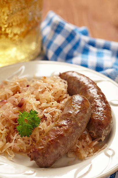 istock grilled bavarian sausages with sauerkraut 467196737
