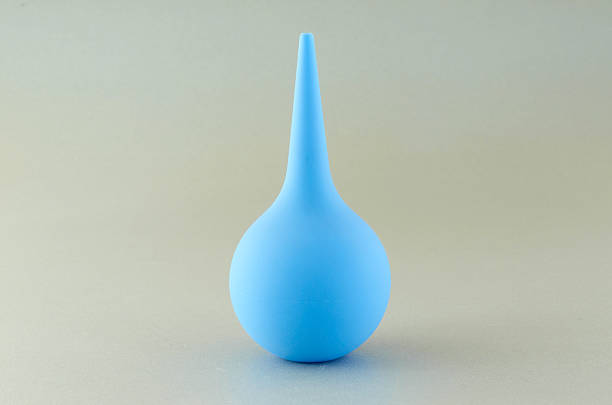 istock Medical enema on a gray background. 467204417