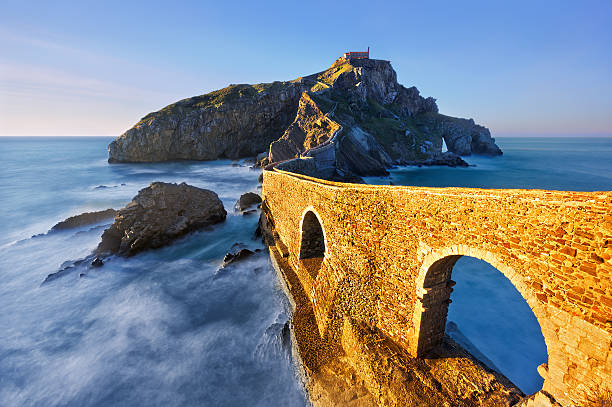 Bridge over the sea to island in San juan de Gaztelugatxe San juan de Gaztelugatxe. Basque Country french basque country photos stock pictures, royalty-free photos & images
