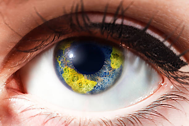 istock earth in beautiful woman eye 467208206