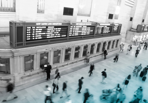 Rush hour at Grand Central Station. People walk through the famous terminal.