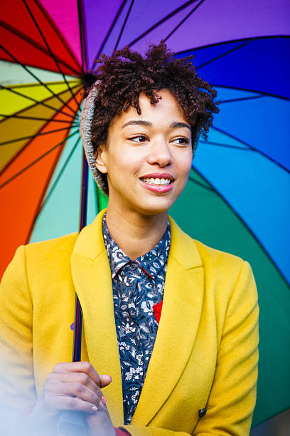 istock Woman with umbrella 467209719