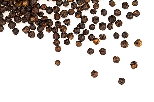 istock closeup dried black pepper on white background 467211842
