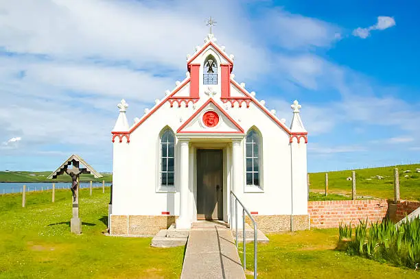 Facade of a small rural church in the countryside - The italian chapel, Orkney, Scotland, UK