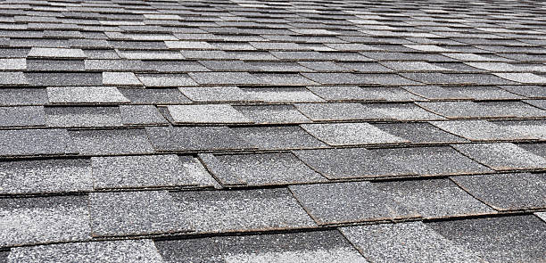 istock Asphalt Roofing Shingles Background. Close up 467212178