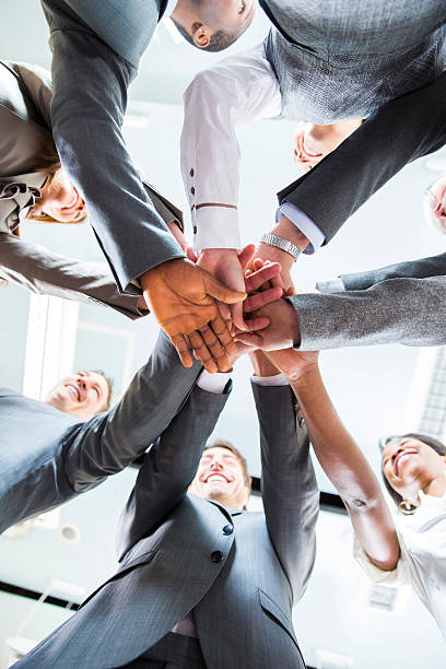 istock Working together.... hands of business team showing unity 467214249