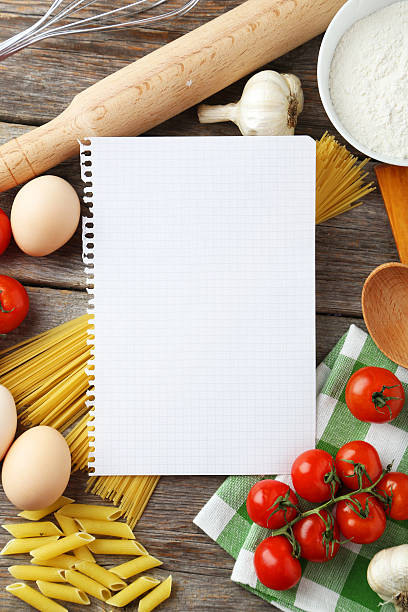 istock Open blank recipe book on grey wooden background 467215816