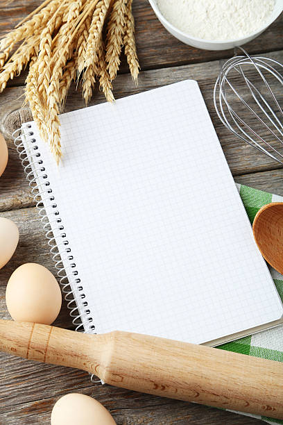 istock Open blank recipe book on grey wooden background 467215818