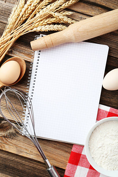 istock Open blank recipe book on brown wooden background 467219926