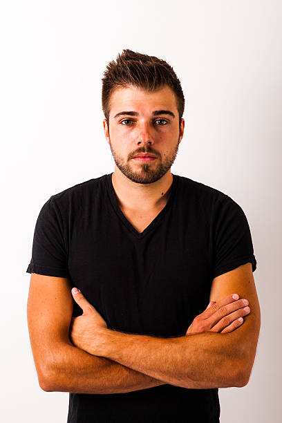 istock Young confident man with arms crossed 467221102