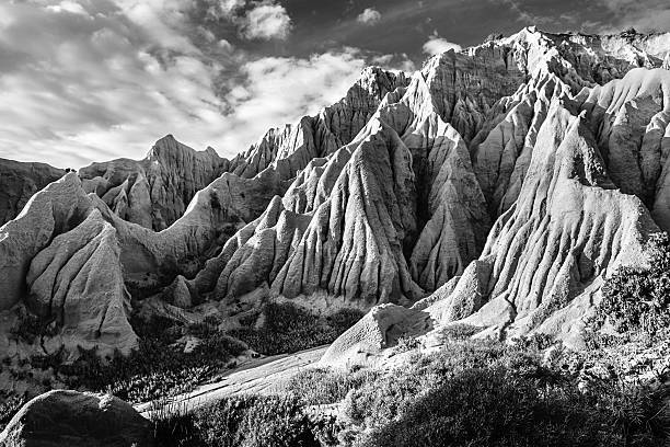 istock sandstone cliff forming strange shapes and textures 467223470