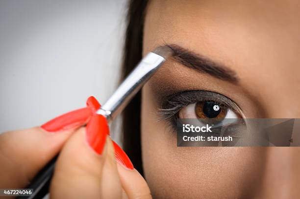 Applying Perfect Makeup Stock Photo - Download Image Now - 2015, Adult, Adults Only