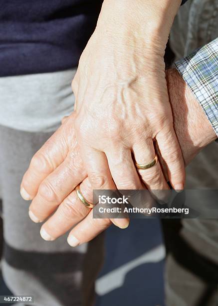 Married Senior Couple Holding Hands Stock Photo - Download Image Now - Wedding Ring, 2015, 70-79 Years