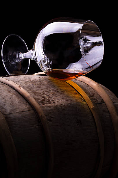 istock Cognac or brandy on a wooden barrel 467227599