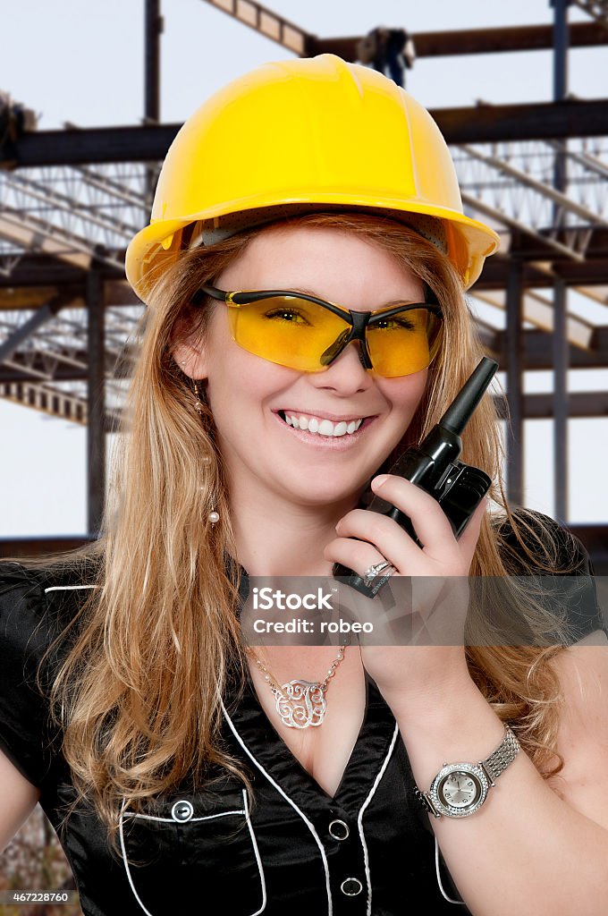 Female Construction Worker Female construction worker on a job site 2015 Stock Photo